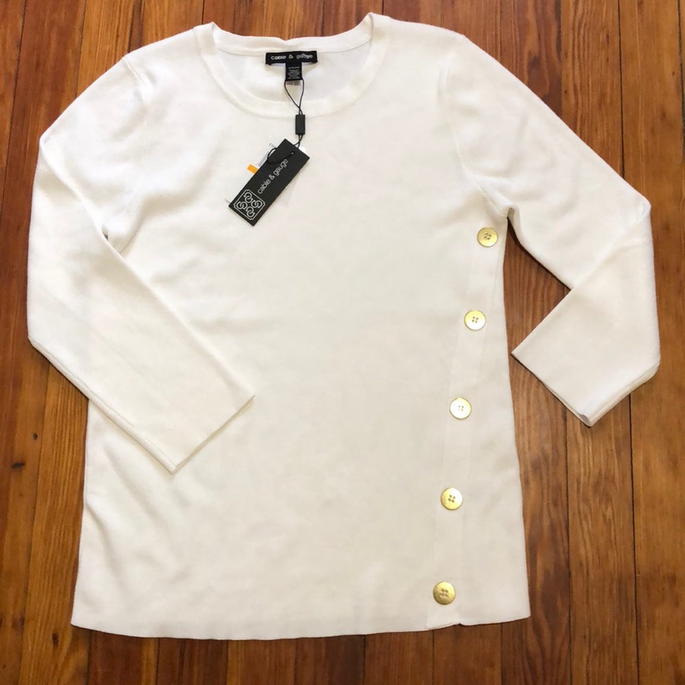 White cable knit crew neck sweater